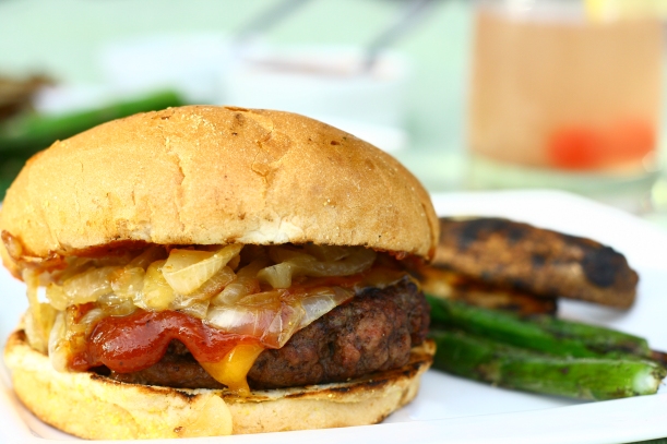whiskey bbq burgers with caramelized onions & cheddar | doughseedough.net